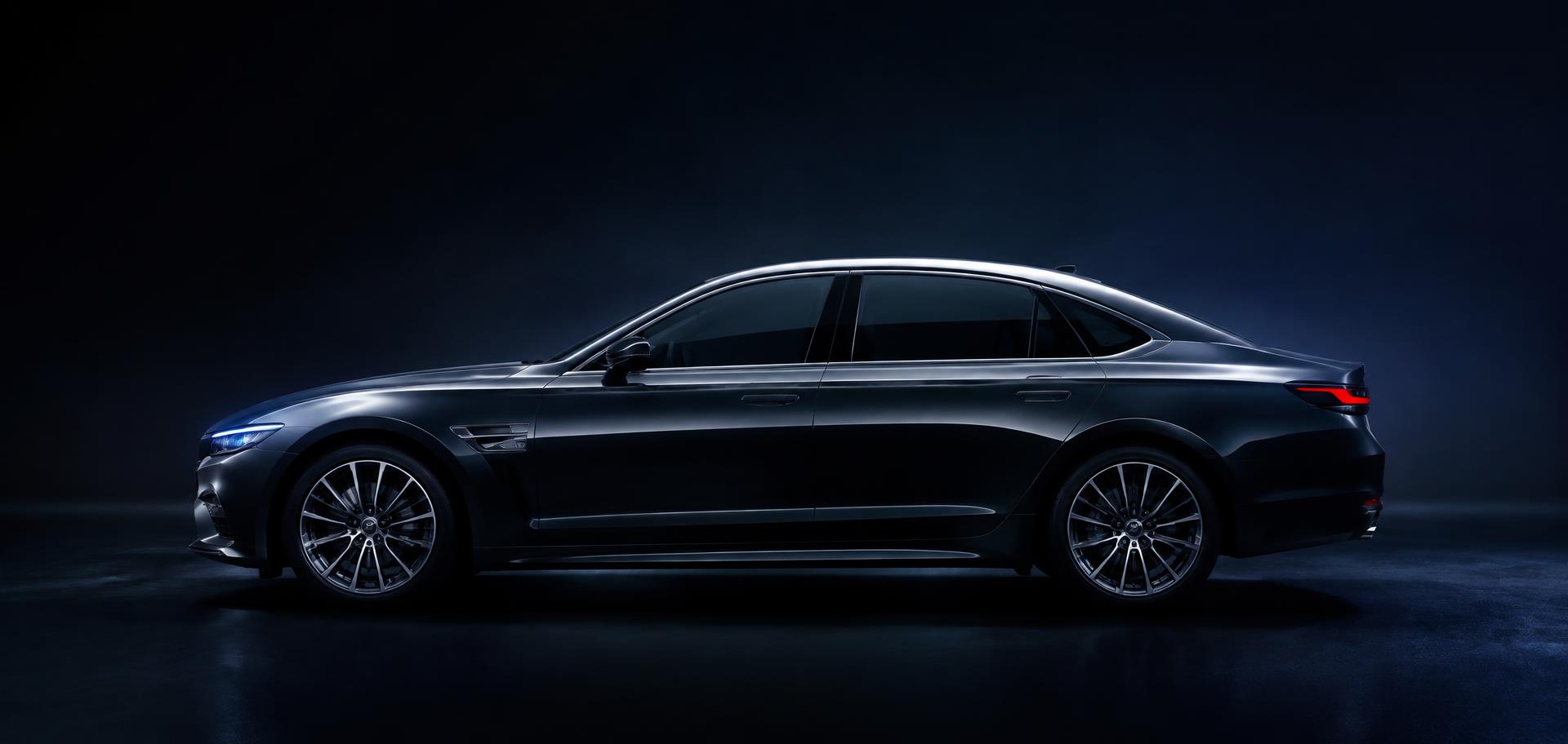Dark luxury sedan in profile with rim lighting
